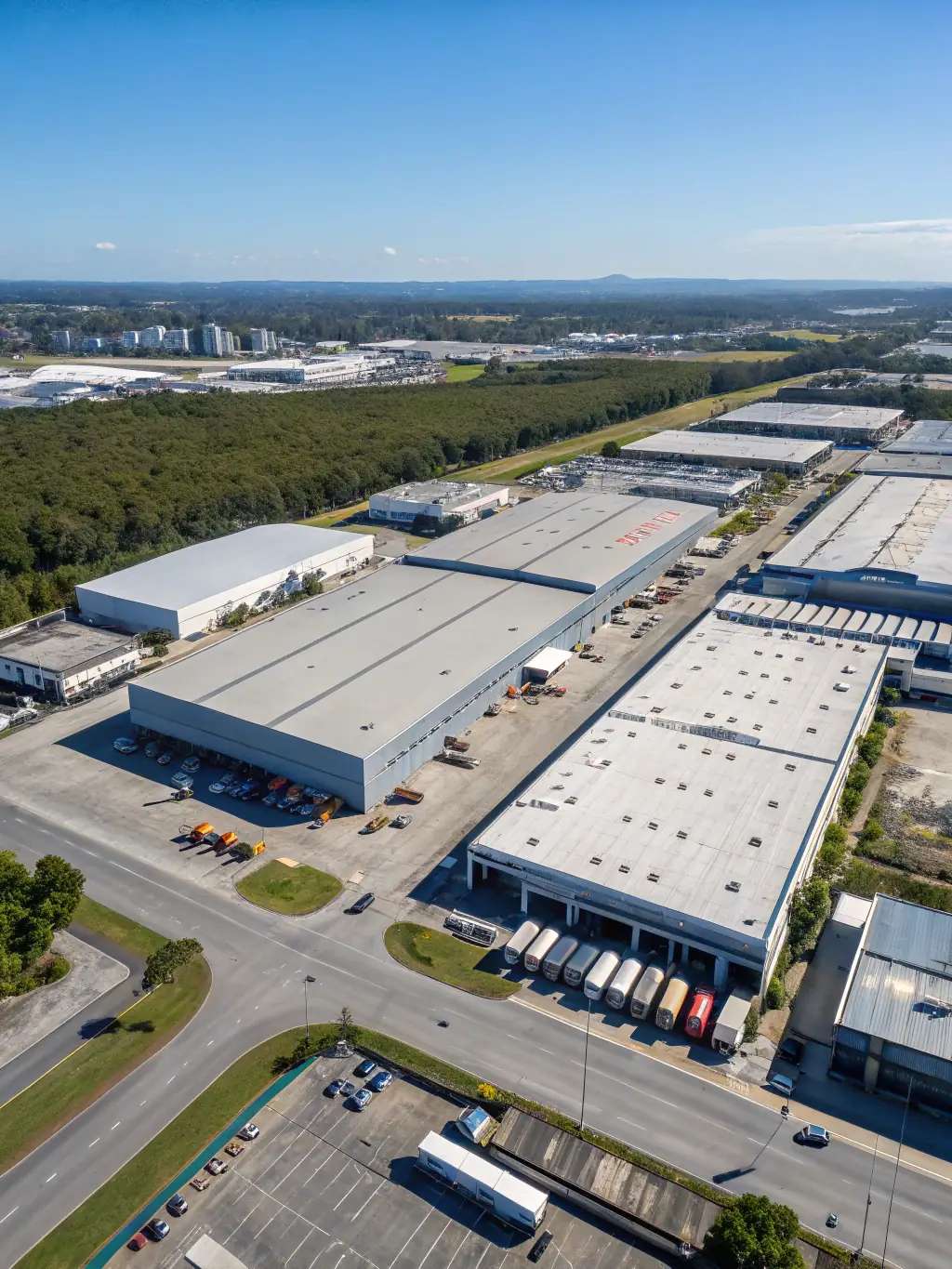 A photograph showcasing a bustling industrial area in Baku, Azerbaijan, with modern buildings and infrastructure, highlighting TLY Global's regional strength.